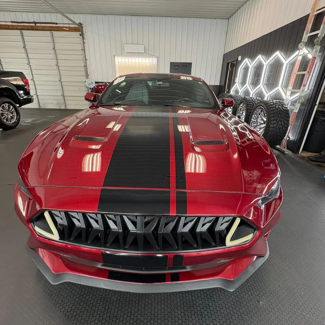Red Mustang with racing stripes after Nano Pro
